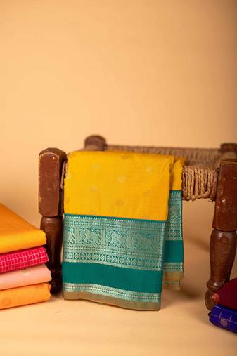 Mustard and blue semi silk saree