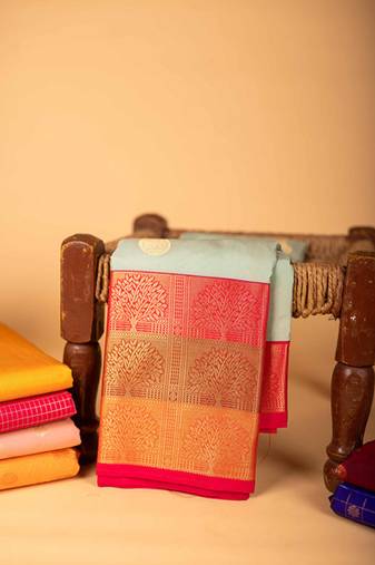 Pastel blue small border semi soft silk saree