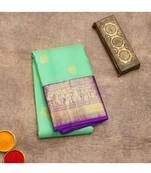 Green and violet kanchi korvai silk saree