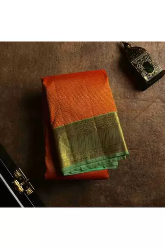 Reddish orange bridal silk saree