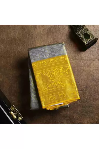 Greyish yellow brocade silk saree