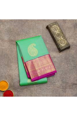 Light green silk saree with pink border 1