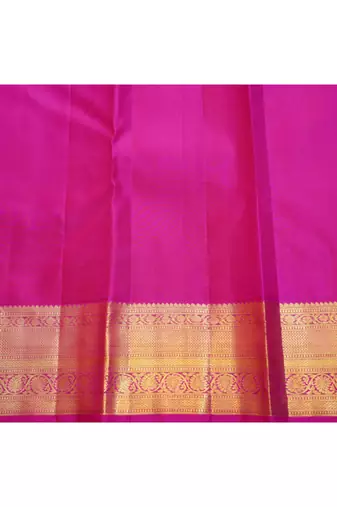 Light green silk saree with pink border