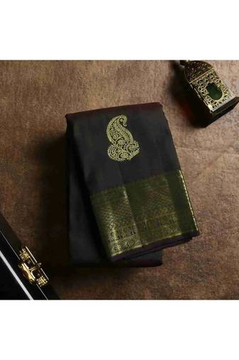 Dark green silk saree with golden border