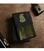 Dark green silk saree with golden border