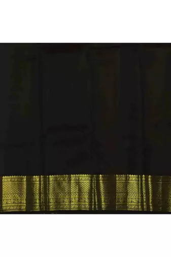 Dark green silk saree with golden border