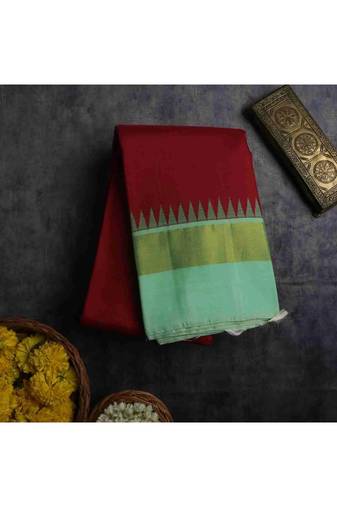 Maroon kanchipuram silk saree with green blouse