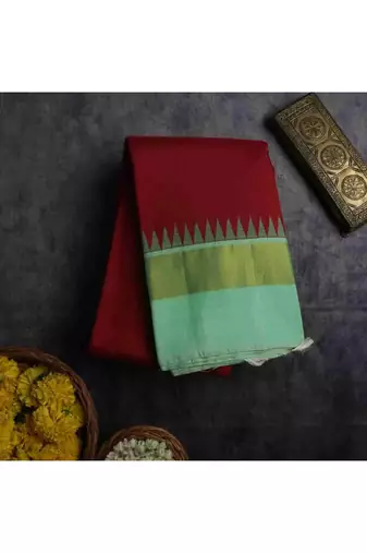 Maroon kanchipuram silk saree with green blouse