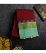 Maroon kanchipuram silk saree with green blouse
