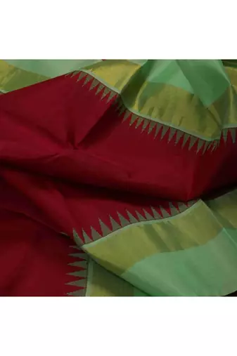 Maroon kanchipuram silk saree with blouse with green blouse