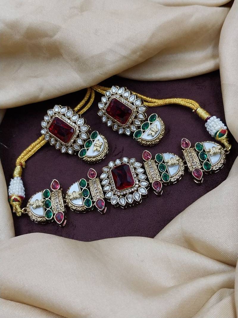 Ruby stone choker necklace set with pearl kundan detailing for women and girls