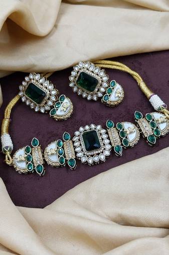 Green stone choker necklace set with pearl kundan detailing for women and girls