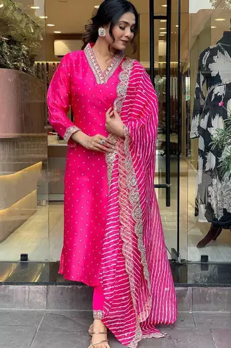 Rani pink embroidered viscos jacquard kurta set with muslin dupatta for women
