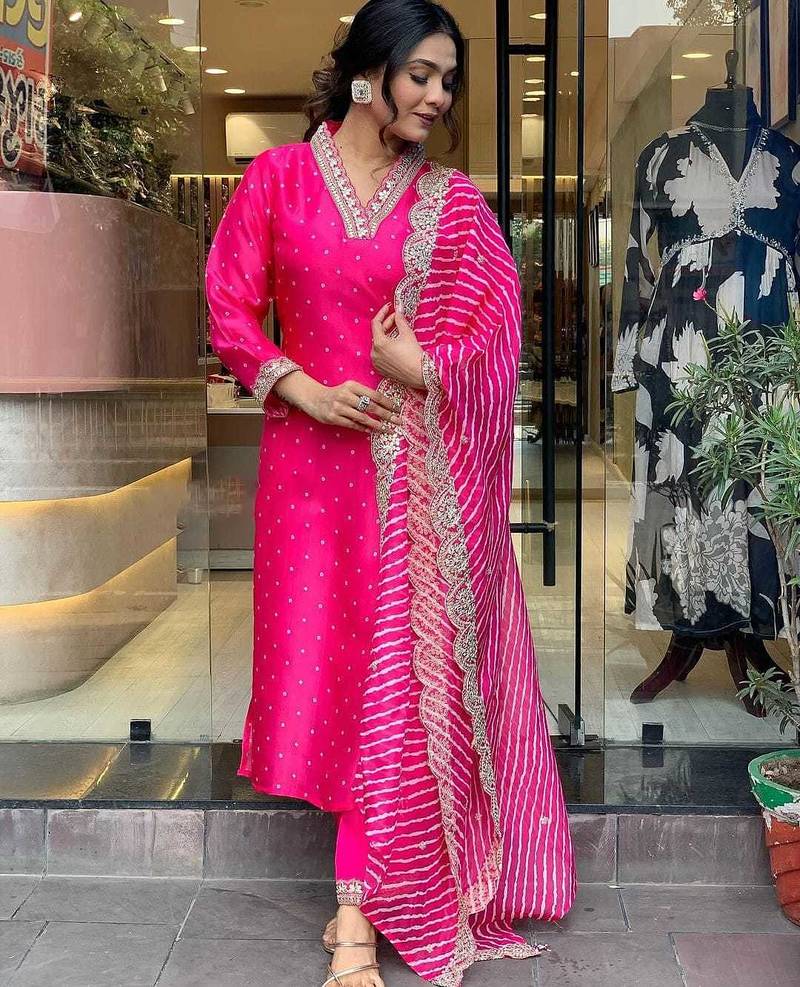 Rani pink embroidered viscos jacquard kurta set with muslin dupatta for women