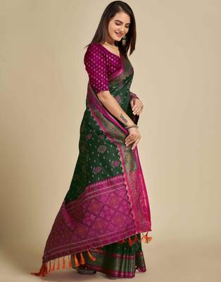 green patola silk blend saree with contrast weave meenakari & tassels 3