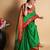 green silk blend saree with striking pallu & blouse