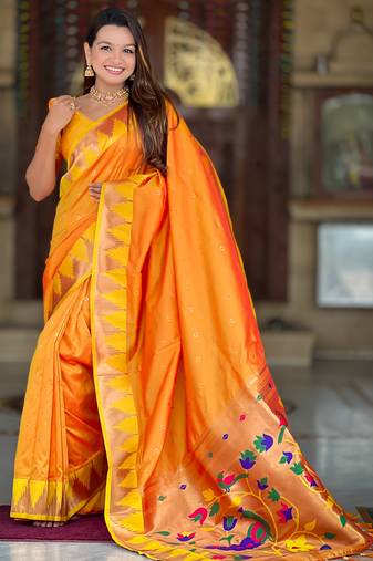 orange paithani silk blend saree with temple weaving border