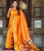 orange paithani silk blend saree with temple weaving border