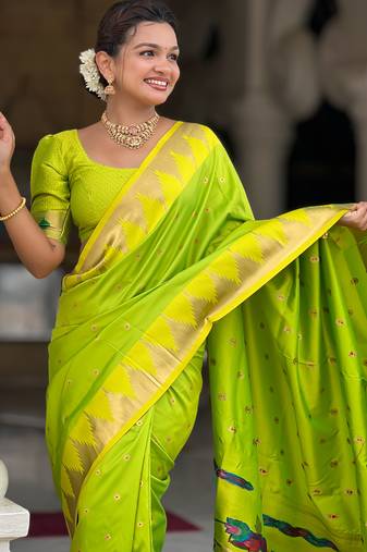 parrot green paithani silk blend saree with temple weaving border