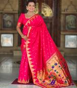rani pink paithani silk blend saree with temple weaving border