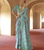 Turquoise silk blend patola design saree