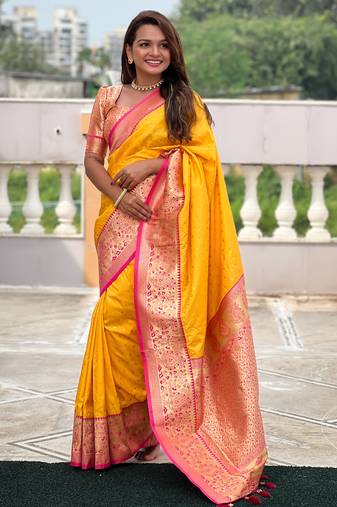 yellow all over zari motifs silk blend saree with contrast pallu