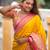yellow all over zari motifs silk blend saree with contrast pallu
