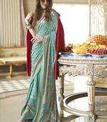 Turquoise fancy foil print work georgette saree