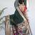 dark green paithani silk blend zari motifs saree with contrast blouse