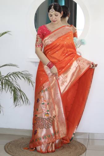 orange paithani silk blend zari motifs saree with contrast blouse