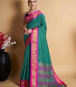 turquoise silk blend saree with striking pallu & blouse