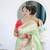 green paithani silk blend zari motifs saree with contrast blouse