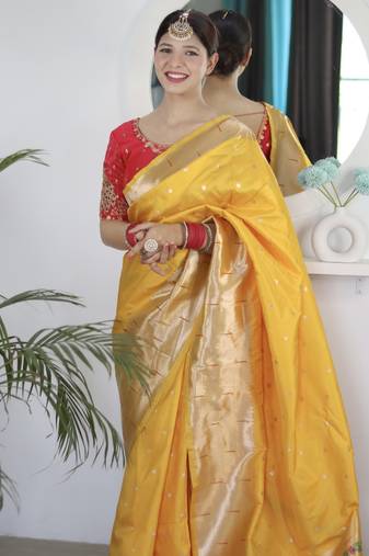 yellow paithani silk blend zari motifs saree with contrast blouse