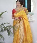 yellow paithani silk blend zari motifs saree with contrast blouse