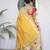 yellow paithani silk blend zari motifs saree with contrast blouse