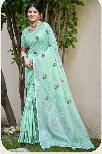 Sea green linen embroidered saree