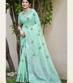 Sea green linen embroidered saree