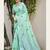 Sea green linen embroidered saree