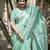 Sea green linen embroidered saree