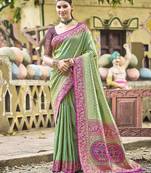 Green kanjivaram silk blend saree