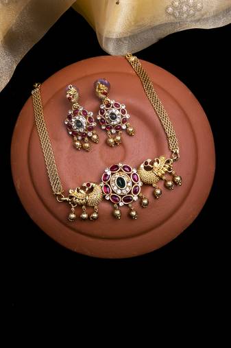 Unique gold plated kemp studded peacock choker set