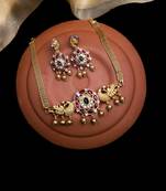 Unique gold plated kemp studded peacock choker set