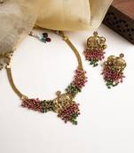 Gold plated gaj necklace set with red green hydra beads