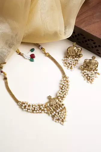Gold plated gaj necklace set with white hydra beads