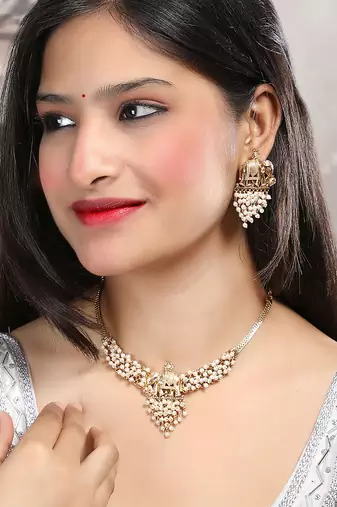 Gold plated gaj necklace set with white hydra beads