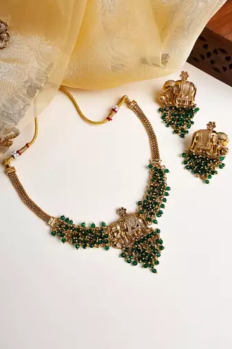 Gold plated gaj necklace set with green hydra beads