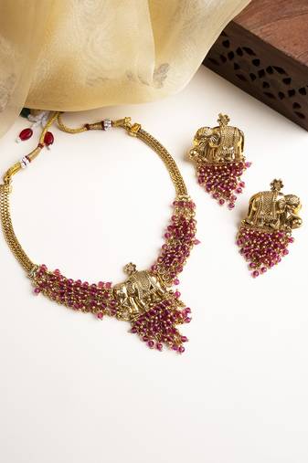 Gold plated gaj necklace set with red hydra beads