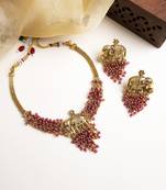 Gold plated gaj necklace set with red hydra beads