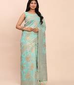 Sea green linen cotton woven saree