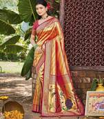Orange kanjivaram silk blend zari woven saree